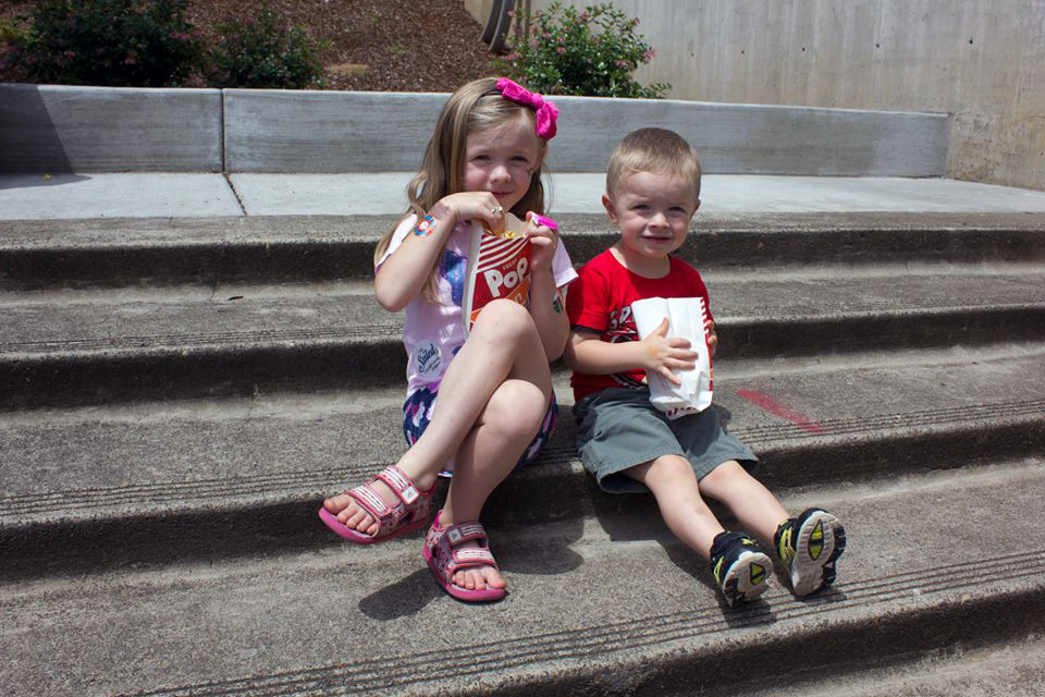 Children enjoy a summer day at the annual Strawberry Short Course Festival in Gresham