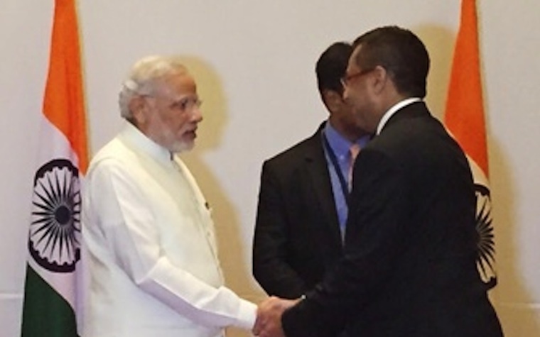 Indian Prime Minister Narendra Modi (left) meets KEF Holdings Chairman Faizal E. Kottikollon.