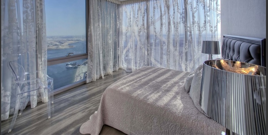 A bedroom in the two bedroom apartment in D1 Towers.