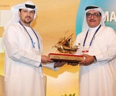Al Harith Al Moosa, vice chairman and deputy general manager of Falconcity of Wonders, on behalf of H.E. Salem Al Moosa, chairman and general manager presented an award to Dubai Municipality during the Middle East Smart Landscape Summit 2015.