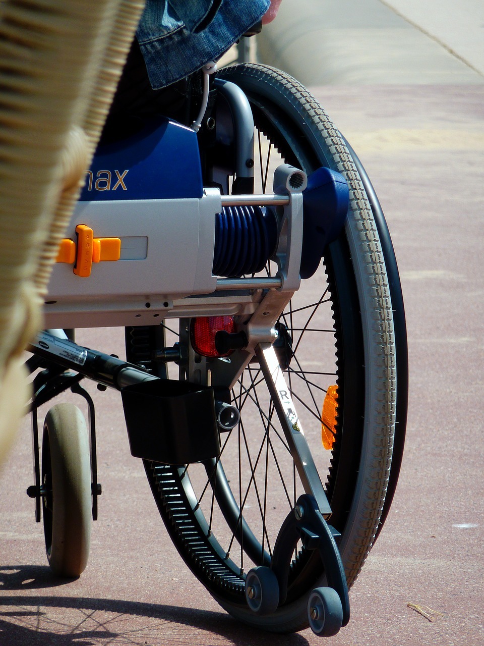 Suit claims man suffered injuries when wheelchair flipped backwards at