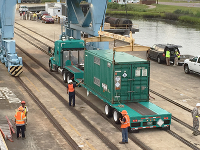 Crews load up 2.2 kilograms of highly enriched uranium held by the University of Basel to be stored at the Savannah River Site.
