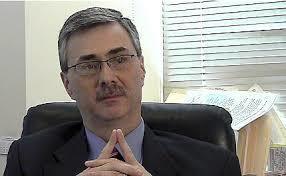 Teacher's union activist Ralph Martire helped author a bill that would require more hiring of teachers at public schools in Illinois.