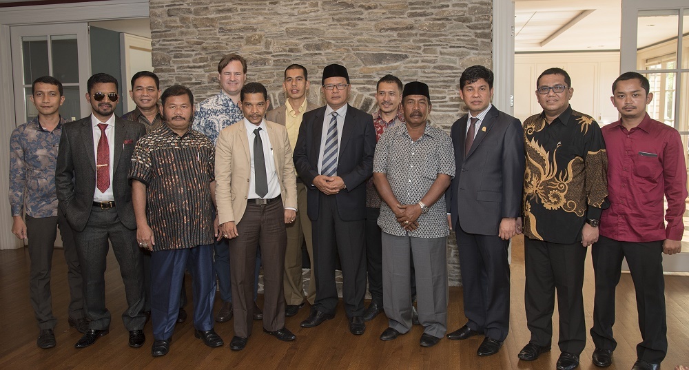 Indonesian officials from the country’s Aceh Province gather in the Alumni Center at the University of Rhode Island.