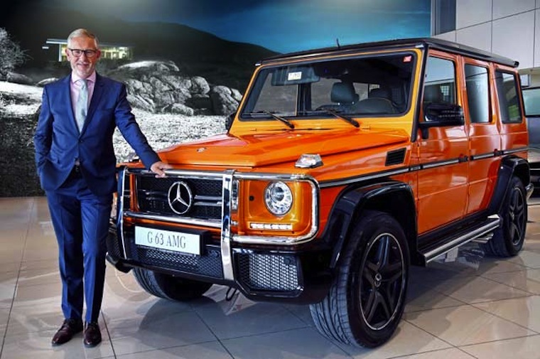 Gargash Enterprises General Manager Karl-Johan Sandesjo stands in front of a car sold by his company.