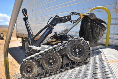 Bomb-disposal robots like this one practiced with their human masters at Sandia National Laboratories' Robot Rodeo this week.