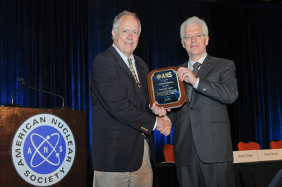 Chair of the ANS Honors and Awards Committee, Steven Xinkle awards the 2015 ANS Special Asward to Richard Lester.