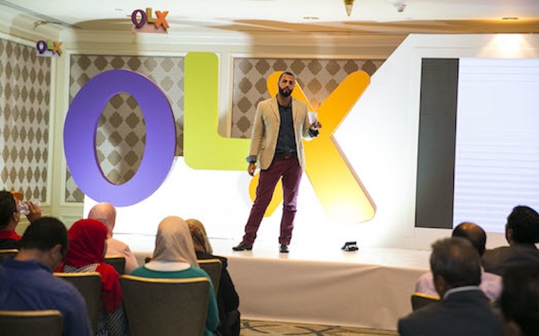 Dubizzle's Senior PR and Communication Manager Abdallah Touqan announces the company's rebranding as OLX.