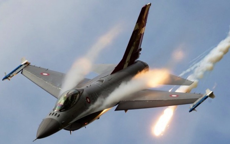 A Royal Danish Air Force F-16 conducts an airstrike on ISIL targets in Iraq, part of the coalition Operation Inherent Resolve effort to counter the terrorist groups activities.