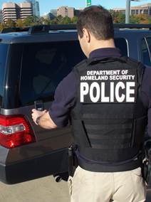 A TSA agent uses the HPT system.