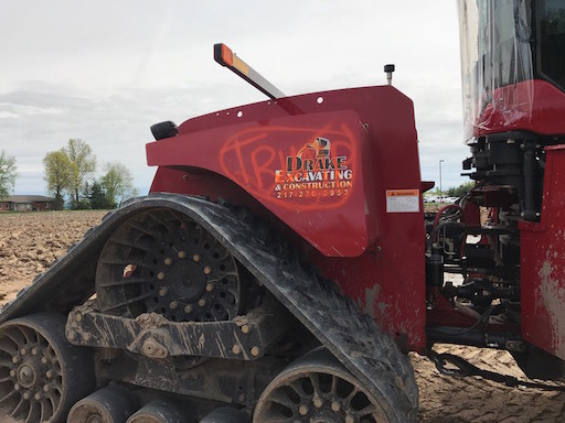 The word Trump is circled and crossed out on a vandalized piece of equipment at one of Rep. Reggie Phillips' worksites.