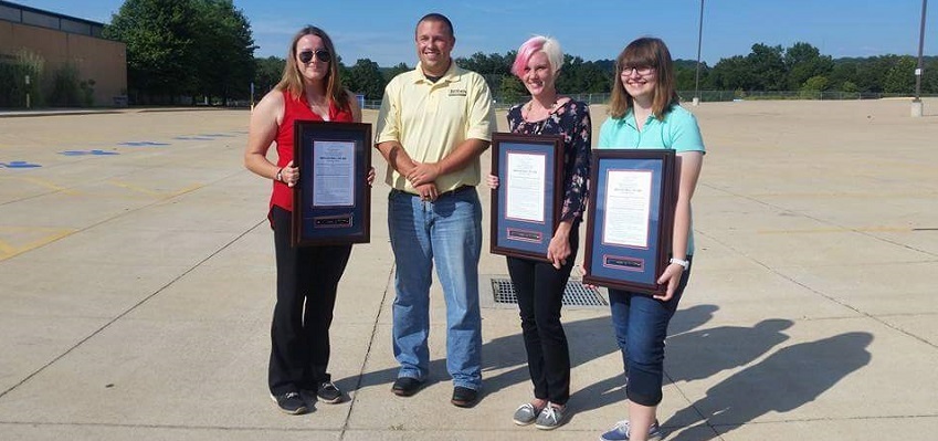 Northwest High School students Claire Hughes, Molly Stuckmeyer and Hannah Nashfrom with Missouri Rep. Shane Roden.