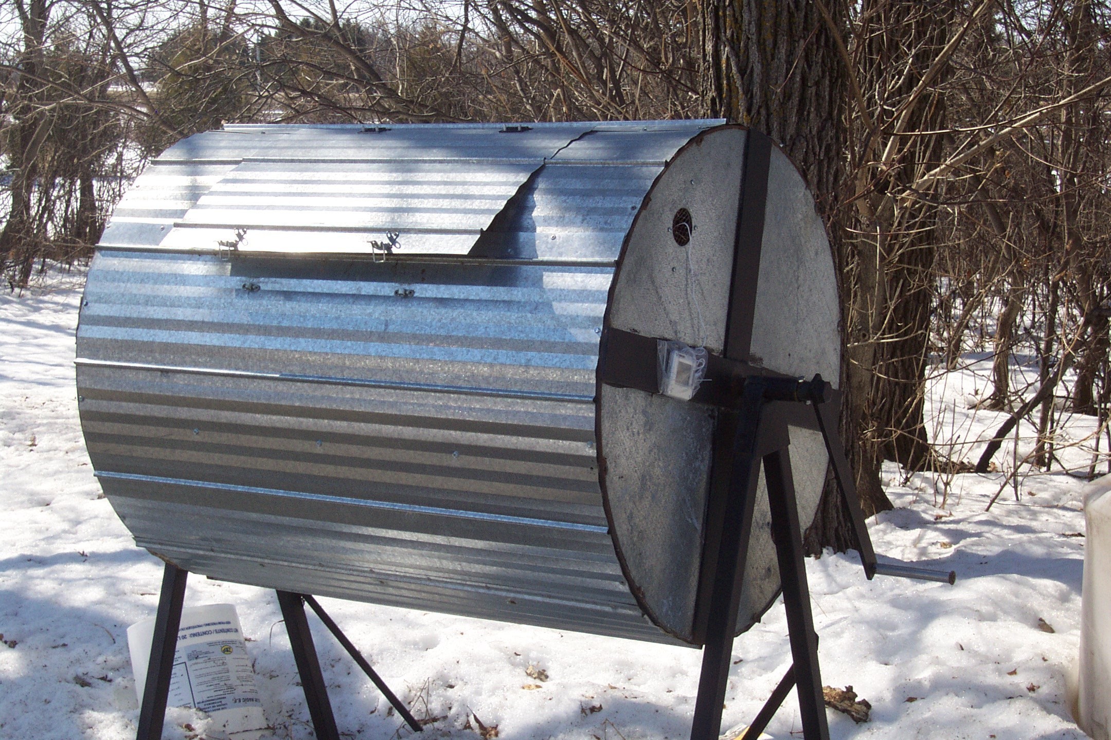 A compost barrel which can be rotated allows for easy mixing.