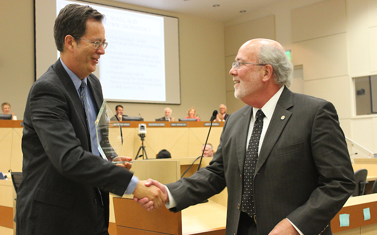 John Wall, right (pictured with Bart Croes, chief of the California Air Resources Board)