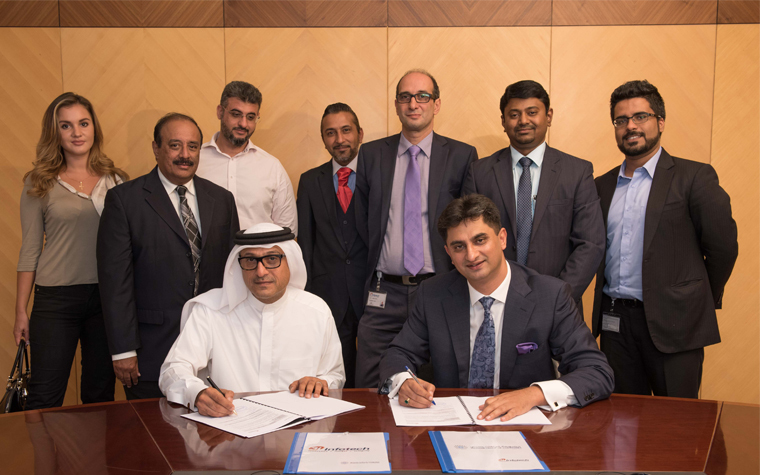 Representatives from the Hassani Group and 3i-Infotech sign the ERP product agreement