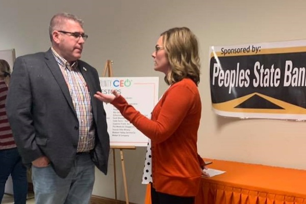 Illinois state House Rep. Darren Bailey (R-Louisville) speaking with a constituent during a CEO program in Jasper county earlier this session