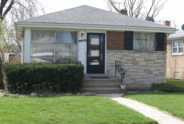 This red and white stone bungalow at 3106 Monroe Street in Bellwood was lost to foreclosure in 2009.