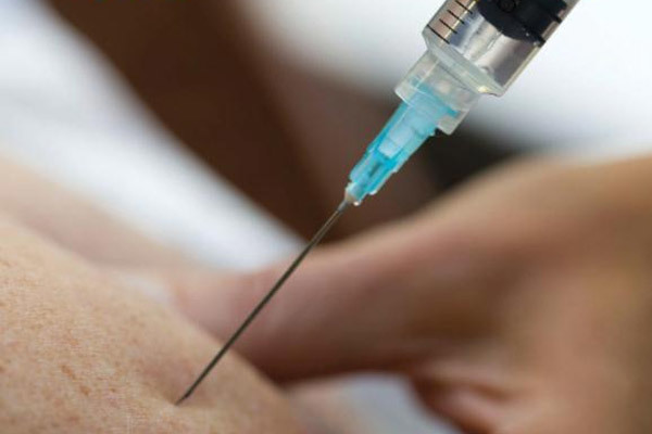 A vaccine is administered.